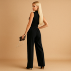 Women’s elegant wrap jumpsuit with wide legs and tailored waist, ideal for formal events, office wear, and chic gatherings.