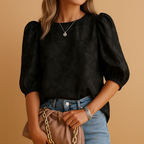 Women’s floral top with elegant pattern and flattering fit, ideal for both casual and formal occasions.