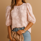 Women’s floral top with elegant pattern and flattering fit, ideal for both casual and formal occasions.