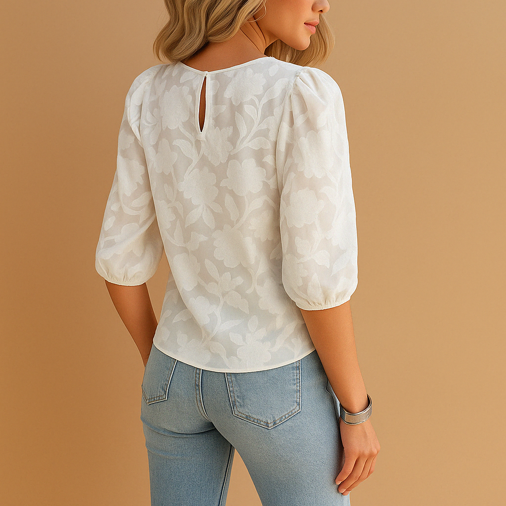 Women’s floral top with elegant pattern and flattering fit, ideal for both casual and formal occasions.
