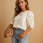 Women’s floral top with elegant pattern and flattering fit, ideal for both casual and formal occasions.