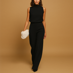 Women’s halter-neck wide leg jumpsuit with bow and pockets, ideal for summer evenings, parties, and stylish gatherings.