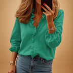 Women’s elegant blouse with ruffle design and flattering fit, ideal for work, casual, or formal occasions.