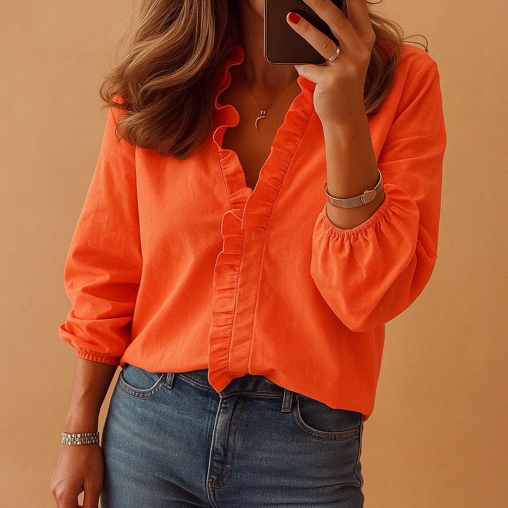 Women’s elegant blouse with ruffle design and flattering fit, ideal for work, casual, or formal occasions.