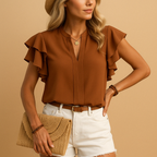 Women’s sleeveless blouse with elegant tailored fit and lightweight fabric, ideal for work and casual chic occasions.