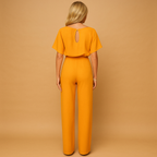 Women’s high waist jumpsuit with lace-up detail, available in elegant colors, ideal for work, outings, or casual-chic occasions.