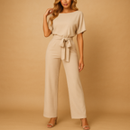 Women’s high waist jumpsuit with lace-up detail, available in elegant colors, ideal for work, outings, or casual-chic occasions.