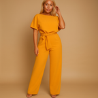 Women’s high waist jumpsuit with lace-up detail, available in elegant colors, ideal for work, outings, or casual-chic occasions.