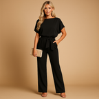 Women’s high waist jumpsuit with lace-up detail, available in elegant colors, ideal for work, outings, or casual-chic occasions.